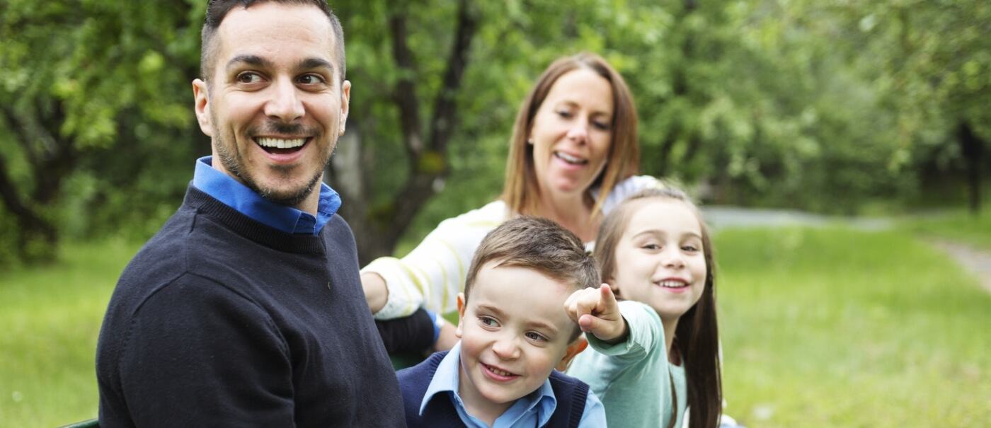 Family smiling together after dental services in Tyler