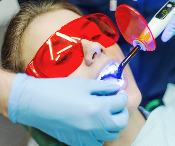 Patient receiving cosmetic dental bonding