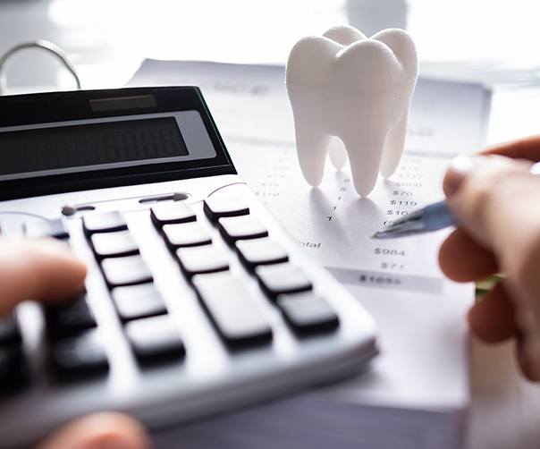 Patient in Tyler budgeting for dental crowns