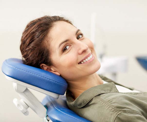 Happy patient visiting her Delta Dental dentist in Tyler
