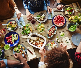 Group of people enjoying a meal together