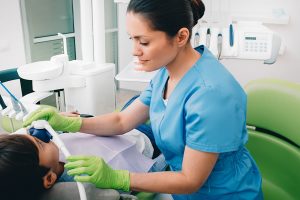 Child at the dentist receiving nitrous oxide.